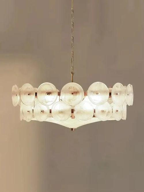 Luxurious Glass Disc Chandelier – 50s Chic featuring postmodern design with amber glass discs and adjustable chain.