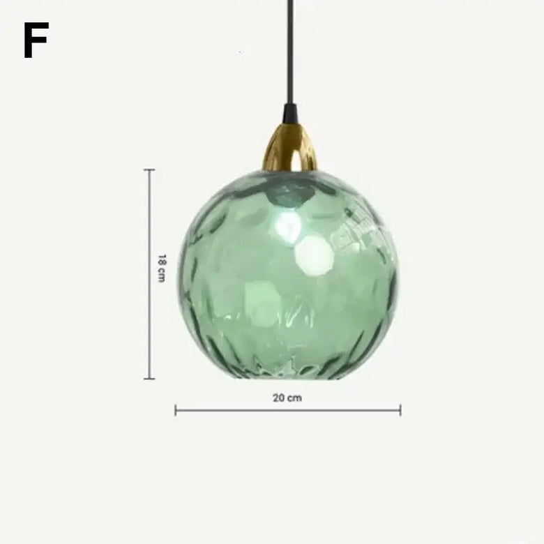 Delicious Lollipop Modern Pendant Light showcasing a green glass ball with gold accents, perfect for vibrant decor.