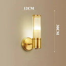 Bathroom Art Deco Brass and Crystal Sconces featuring elegant design with dimmable LED lighting.