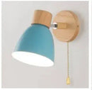 Modern Sconce With Switch featuring a sleek design and blue shade, ideal for modern home decor.