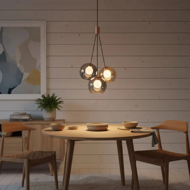 Triple Glass Globe Pendant Light with Rose Gold Accents