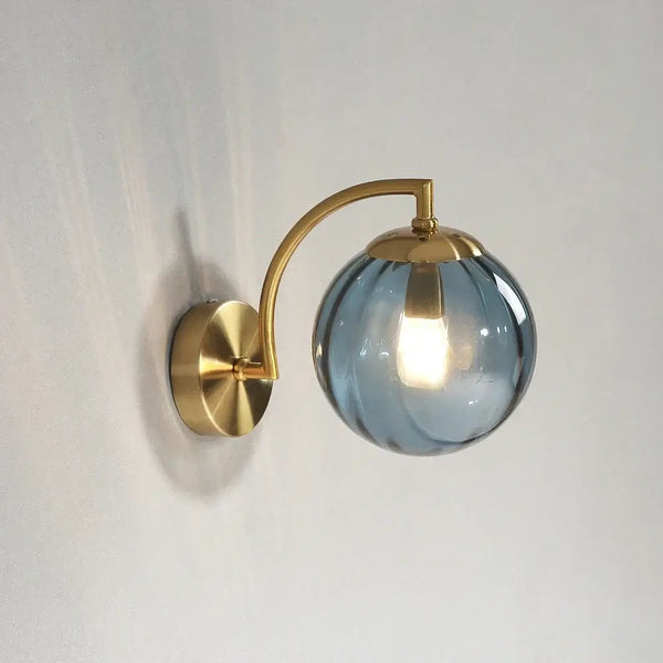 Colourful Glass Modern Wall Light with a golden metal base and blue glass shade, perfect for adding elegance.