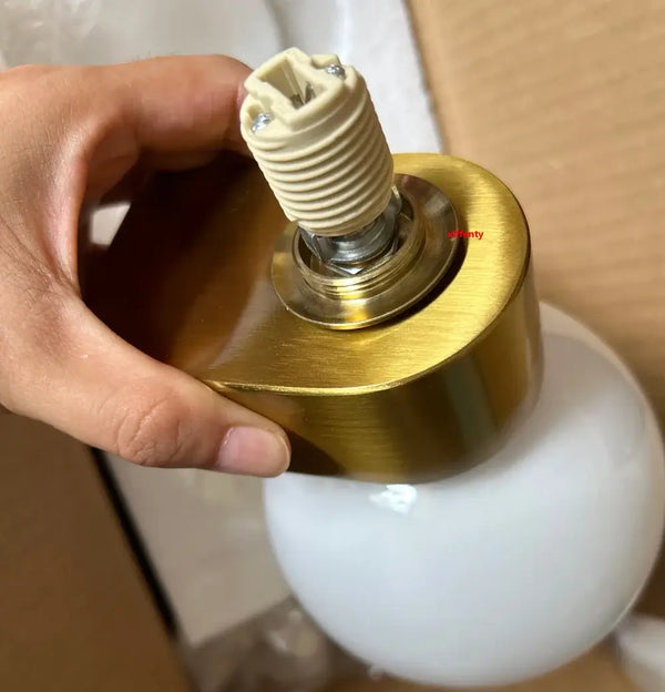Chic Dual Bubble Wall Light - Modern & Versatile Lighting close-up of brass fixture with bulb holder