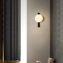 Decorative Lighting Fixture With Milk White Glass Sphere mounted on a stylish wall in a modern setting.