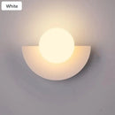 Halfmoon Metal Sconce in white, modern Nordic design with LED light, suitable for living room and bedroom.