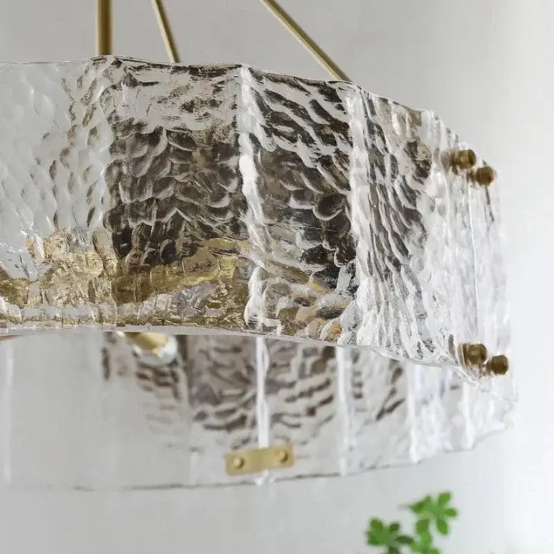 Textured Glass Crystal Pendant Light with Gold Frame showcasing crystal detailing and warm lighting.