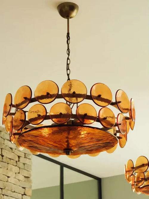 Luxurious Glass Disc Chandelier – 50s Chic with amber glass discs for vintage European luxury decor.