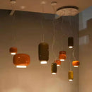 Modern Glass Pendant Light – Italian-Inspired LED Suspension Lamp in various colors hanging elegantly.