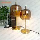 Czech Design Desk Lamps with Glass Shade showcasing elegant LED lights and artistic amber glass shades.