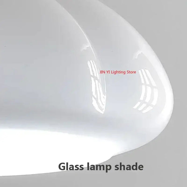 The Ideal Modern Kitchen Glass Pendant featuring a creamy white glass lamp shade for stylish illumination.