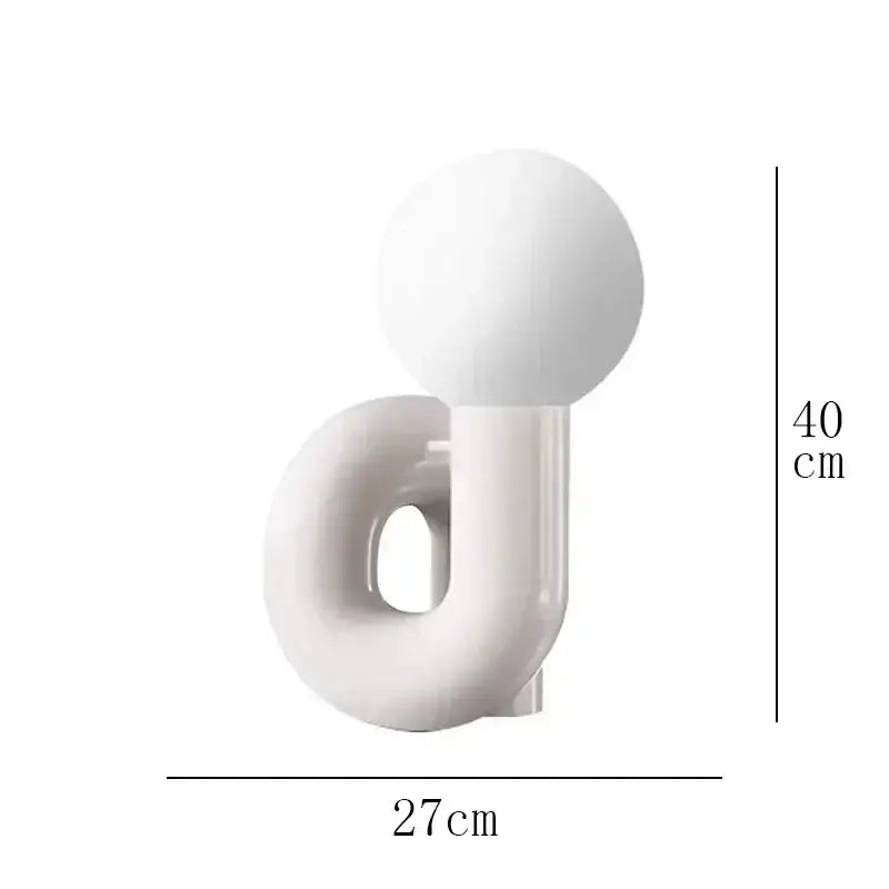 Sculptural Resin Table Lamp – Italian-Inspired Modern Lighting featuring a frosted glass globe.