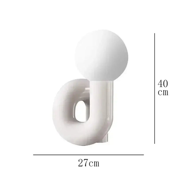 Sculptural Resin Table Lamp – Italian-Inspired Modern Lighting featuring a frosted glass globe.