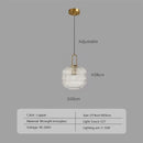 Pendant Light: Modern Nordic Glass Hanging Lighting Fixtures with adjustable copper design and striped glass shade.