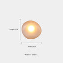 Elegant Frosted Glass Pebble Wall Lamp - Minimalist Nordic Style in amber color with dimensions 22CM x 20CM.