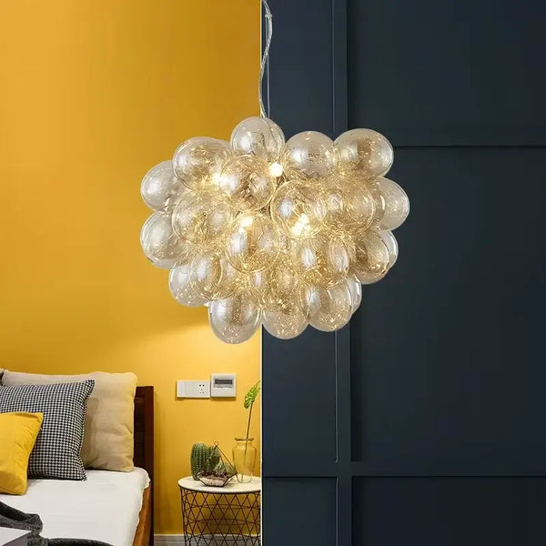 Nordic Smoke Glass Bubble Chandelier – Modern Grape Cluster Pendant Light hanging in a stylish bedroom.