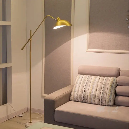 Marble Based 50s Floor Lamp - Vintage Modern Lighting in a stylish living room setting with a gray sofa.