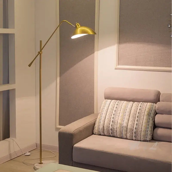 Marble Based 50s Floor Lamp - Vintage Modern Lighting in a stylish living room setting with a gray sofa.