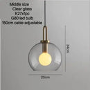 Grey Frosted Sphere Glass Hanging Lamp with clear glass and adjustable cable for versatile home decor.