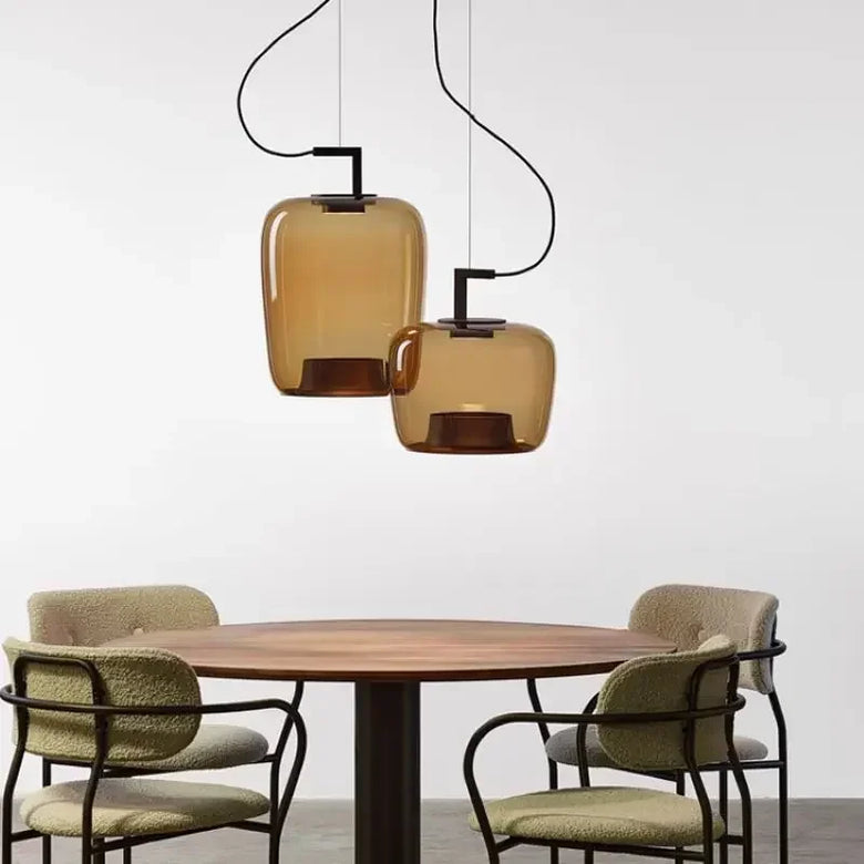 Modern Glass Pendant Light with Iron Detailing