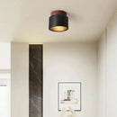 Black Travertine Ceiling Lamp illuminating a modern interior with Wabi-sabi elegance and natural stone design.