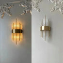 Unique Collection of Art Deco Sconces featuring stunning light designs and luxurious gold finishes.