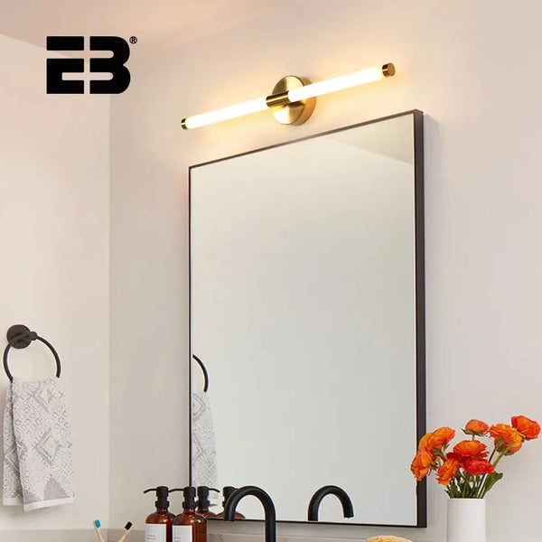 Contemporary Vanity Wall Light with etched glass shade above a modern mirror in a stylish bathroom setting.