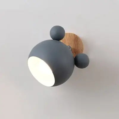 Mouse-shaped Wall Lamps in gray color on a wooden mount, adding playful lighting to your decor.