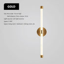 Postmodern Tube Pipe  Wall Light in gold finish with LED light source for modern living space decor.