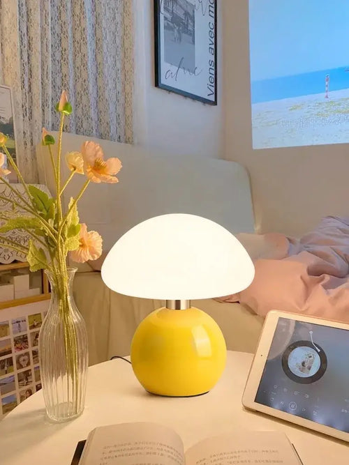 Mushroom LED USB Table Lamp in Pink – Soft Glow Bedside Lighting on a table with flowers and a tablet.