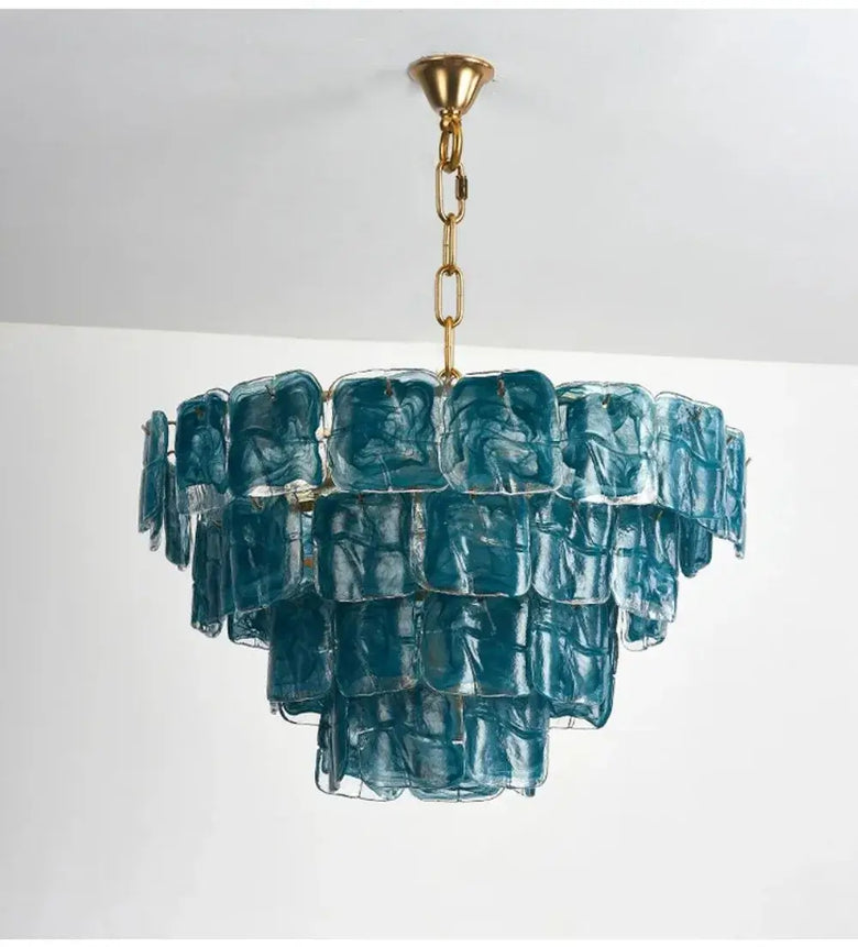 Blue Glass Chandelier with Polished Chrome Finish, artisan-crafted for elegant interior lighting.