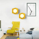 Chic Modern Sconce Collection – Illuminate with Style showcased in a colorful living space with yellow accents.