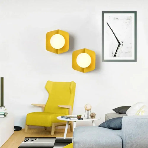 Chic Modern Sconce Collection – Illuminate with Style showcased in a colorful living space with yellow accents.