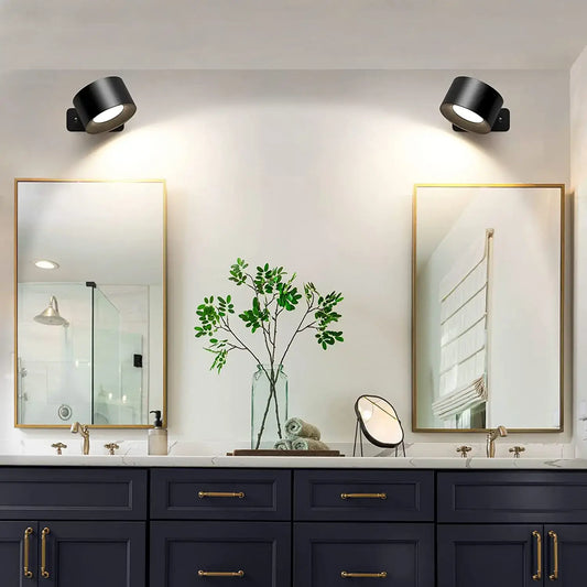Rechargeable Bedside Wall Lamp illuminating a stylish bathroom with mirrors and greenery.