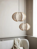 Nordic Spider Web Pendant Light inspired by the 70s! with natural rattan design, perfect for modern interiors.