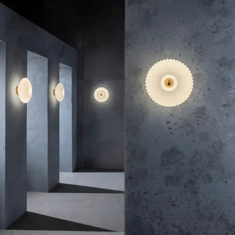 Radiant Modern Glass Wall Lamp illuminating a contemporary hallway with elegant design.