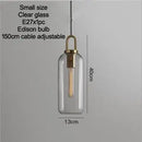 Grey Frosted Sphere Glass Hanging Lamp with a unique design and adjustable cable for any room decor.