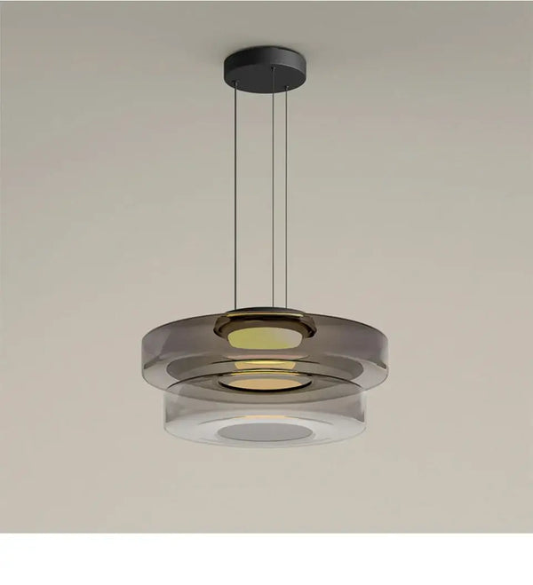 Layered Glass Pendant Light – Modern Amber, Green or Smoke Grey LED Suspension hanging from the ceiling.