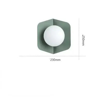 Chic Modern Sconce Collection – Illuminate with Style, hexagon design sconce with white glass and green base.