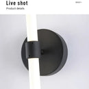 Close-up of the Postmodern Tube Pipe Wall Light showcasing the black fixture and fluorescent tube design.