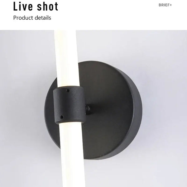 Close-up of the Postmodern Tube Pipe Wall Light showcasing the black fixture and fluorescent tube design.