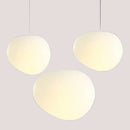 Simple Nordic Restaurant Pebble Chandelier featuring three minimalist pebble-shaped pendants in a sleek design.
