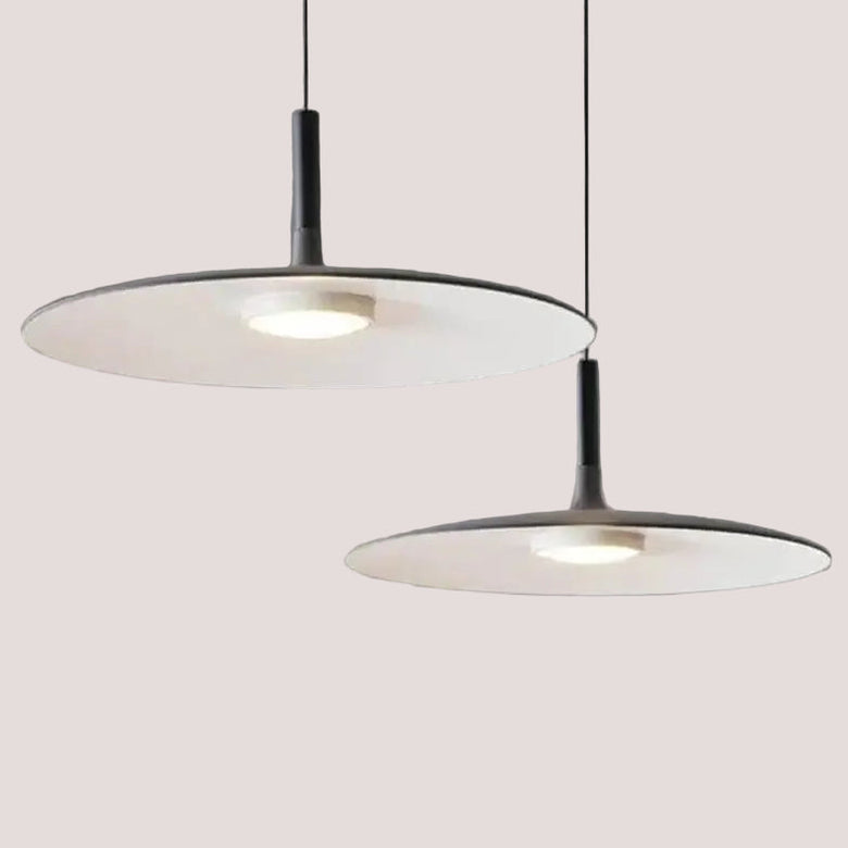 Sleek, Modern Led Pendant Lamps in minimalist design, featuring two stylish hanging lamps with circular shades.