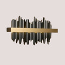 Striking Black and Gold Wall Lamp featuring a modern design with luxurious materials.