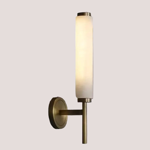 Stylish Art Deco Brass Wall Lamp featuring frosted glass and warm white illumination for elegant decor.