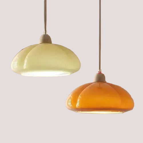 The Ideal Modern Kitchen Glass Pendant featuring Nordic inspired pumpkin shape in creamy white and orange.
