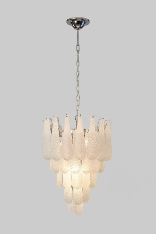 hero 
Vintage Drop Glass Chandelier with LED illuminating softly in an elegant design with white glass accents.