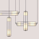 White Glass & Metal Art Deco Chandelier featuring elegant design with white glass and metal details.