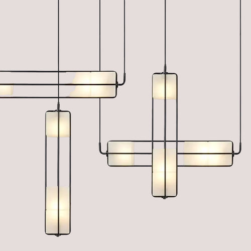 White Glass & Metal Art Deco Chandelier featuring elegant design with white glass and metal details.