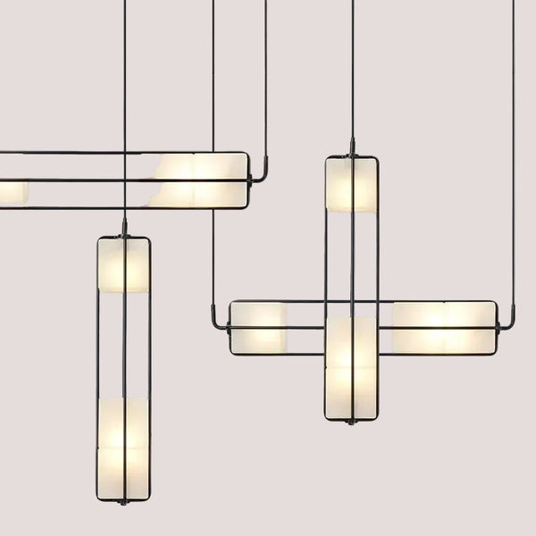White Glass & Metal Art Deco Chandelier featuring elegant design with white glass and metal details.