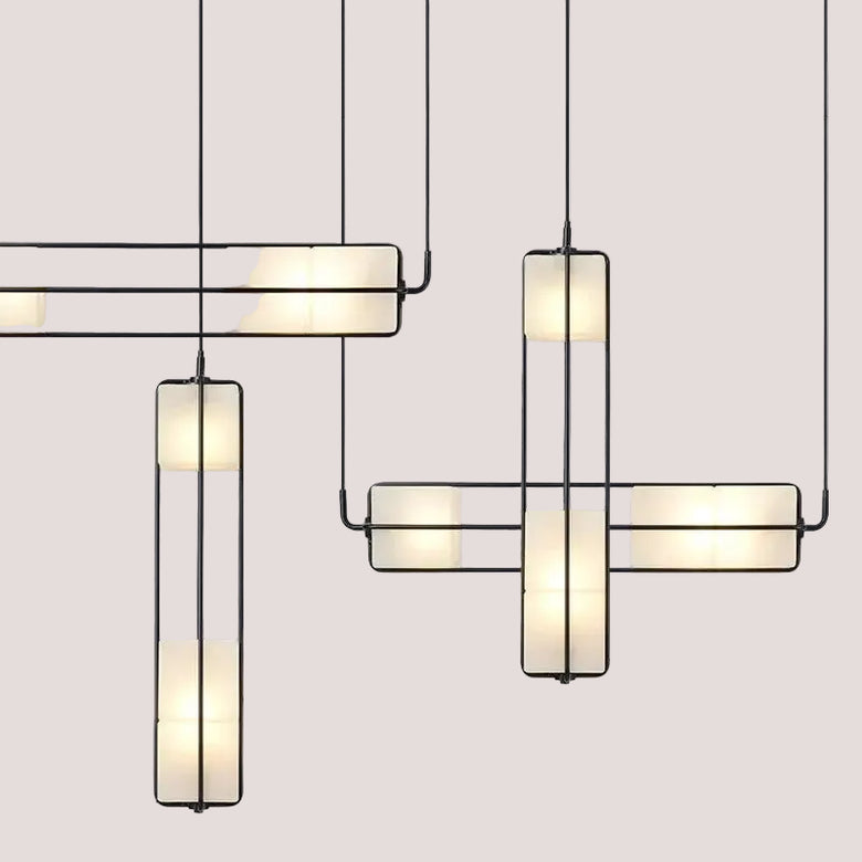 White Glass & Metal Art Deco Chandelier featuring elegant design with white glass and metal details.